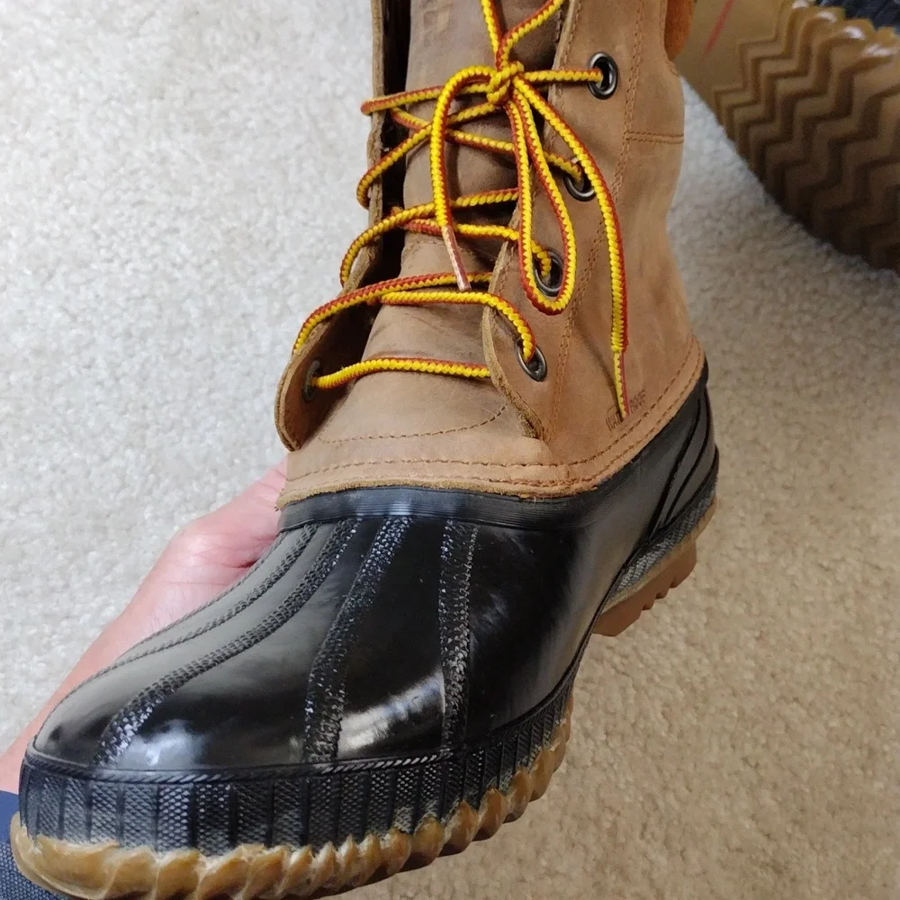 Sorel men's black rubber & tan leather winter boots. Size 11.5